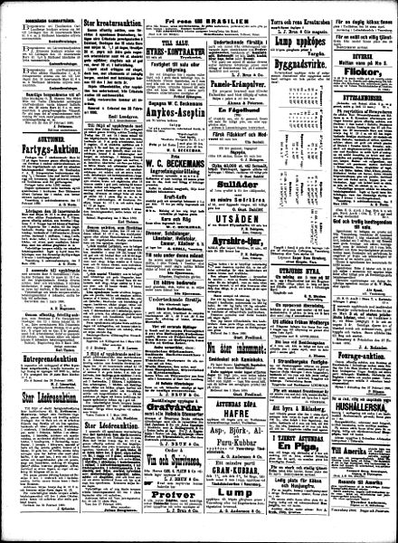 An old newspaper with a dense, six-column-layout. Photograph.